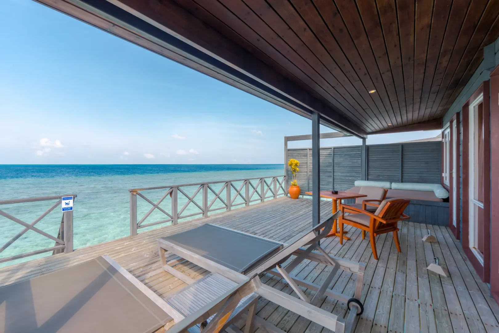 komandoo maldives jacuzzi water villa deck showcasing serene overwater luxury and tranquil ocean views