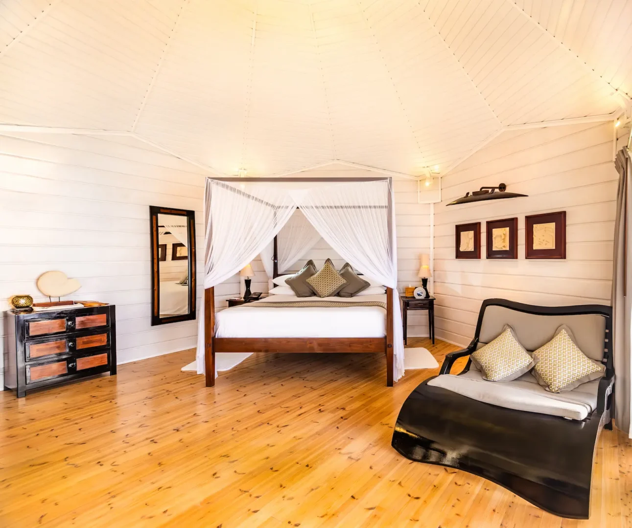 komandoo maldives jacuzzi water villa interior bed showcasing serene island luxury over the lagoon