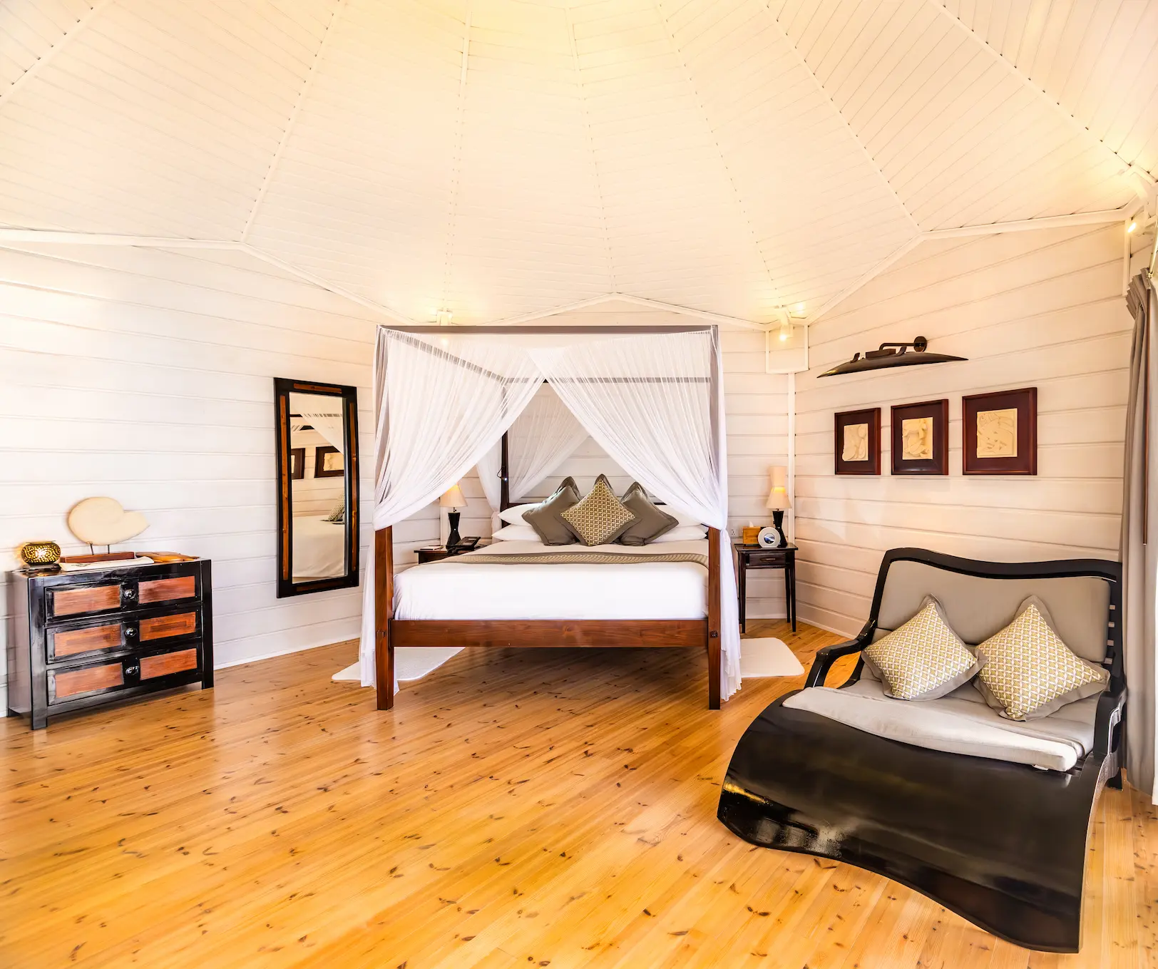 komandoo maldives jacuzzi water villa interior bed showcasing serene island luxury over the lagoon