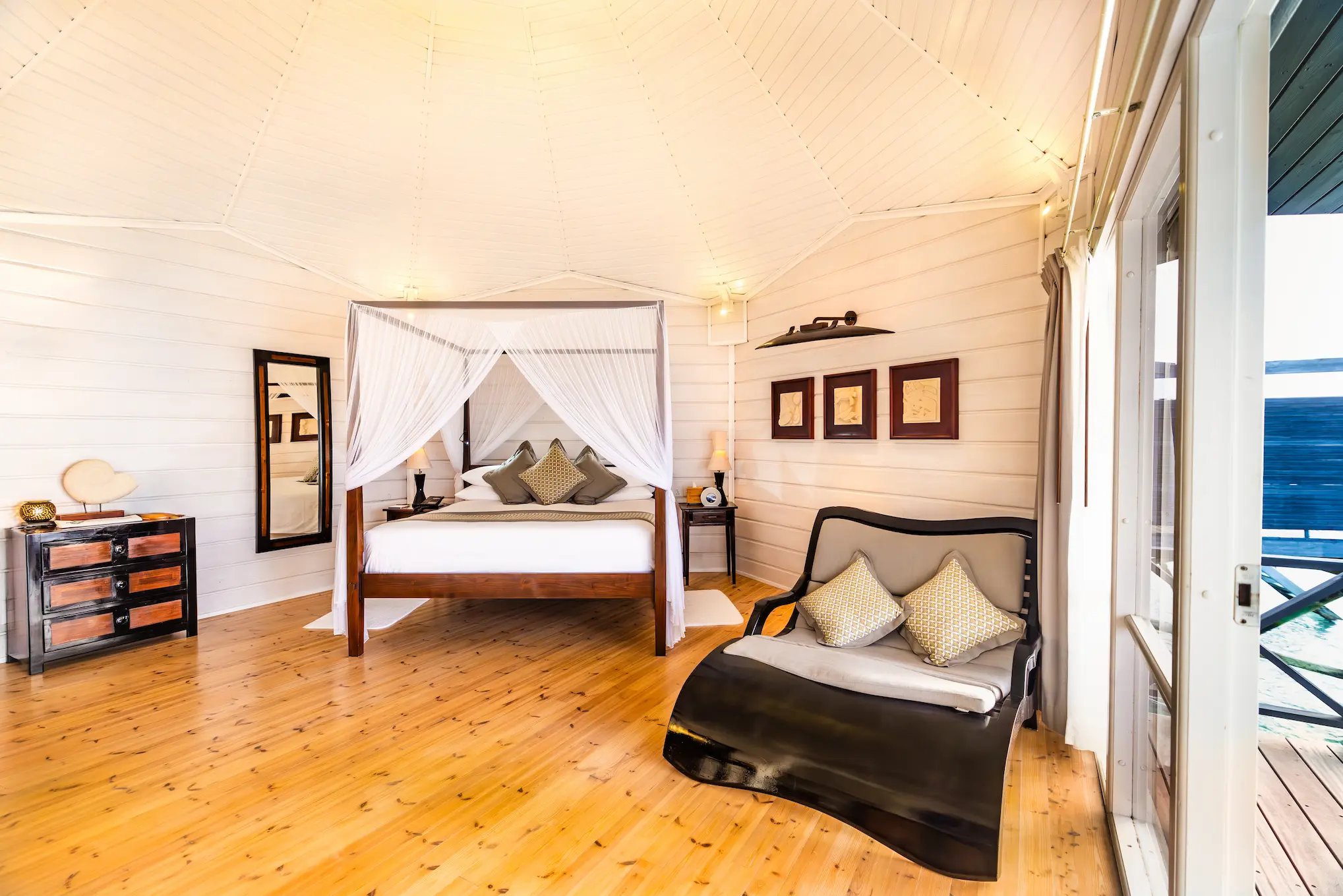 komandoo maldives ocean jacuzzi water villa interior bed showcasing serene overwater luxury and elegant island comfort