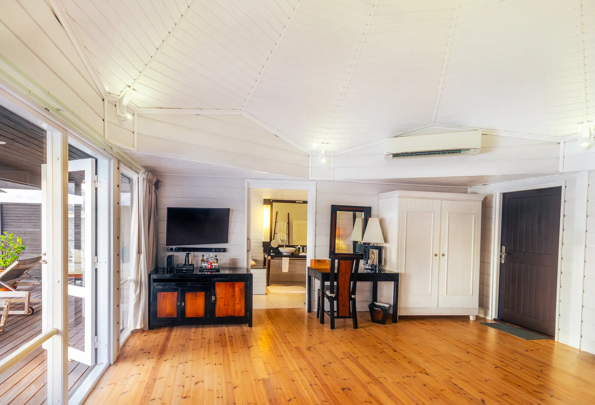 komandoo maldives ocean jacuzzi water villa interior showcasing refined overwater luxury and serene island ambience