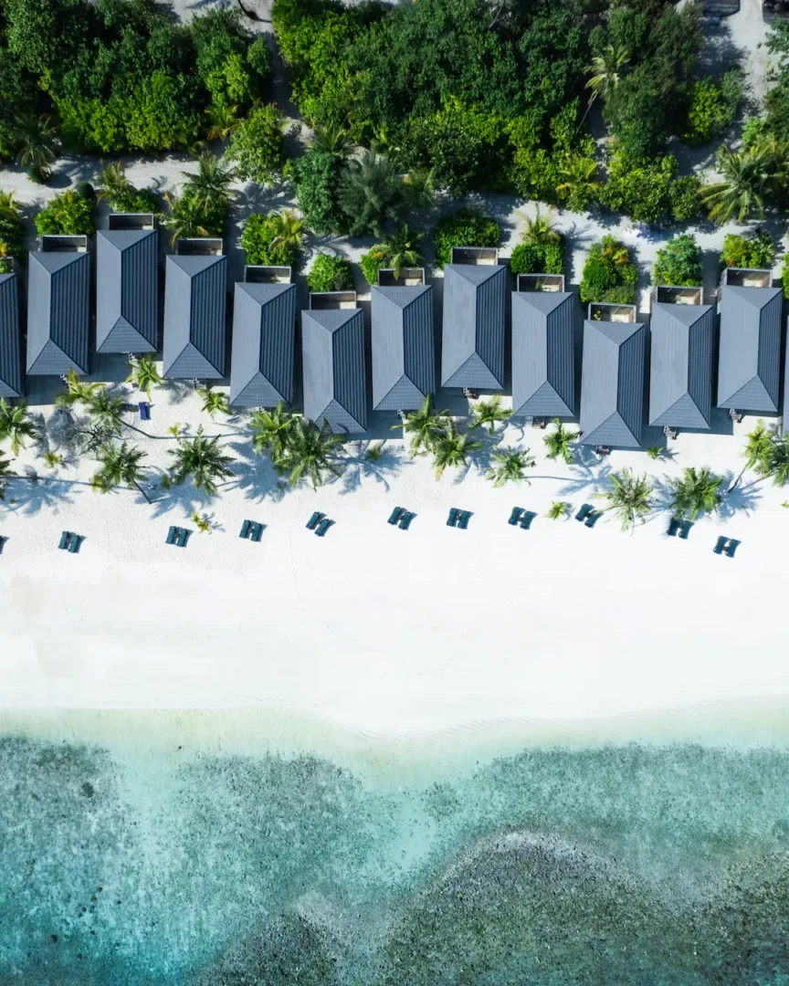 kuredu island resort & spa maldives beach villa drone