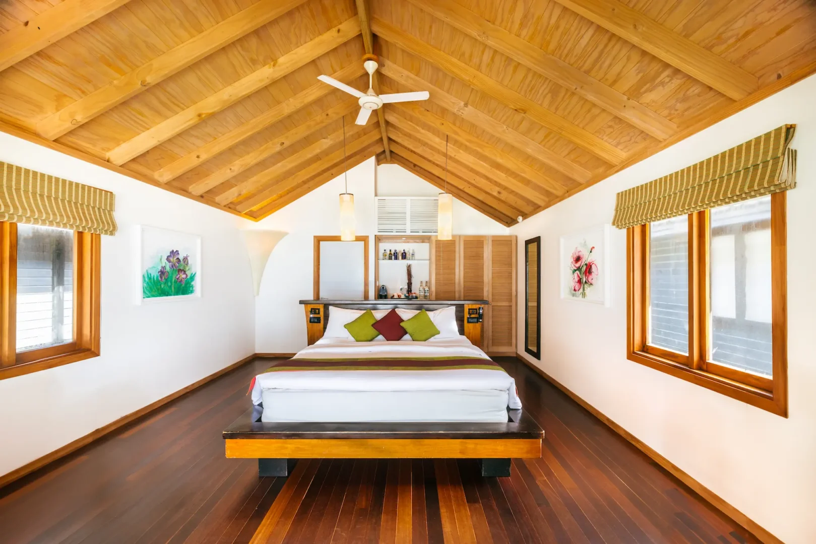 kuredu island resort & spa maldives beach villa interior bed