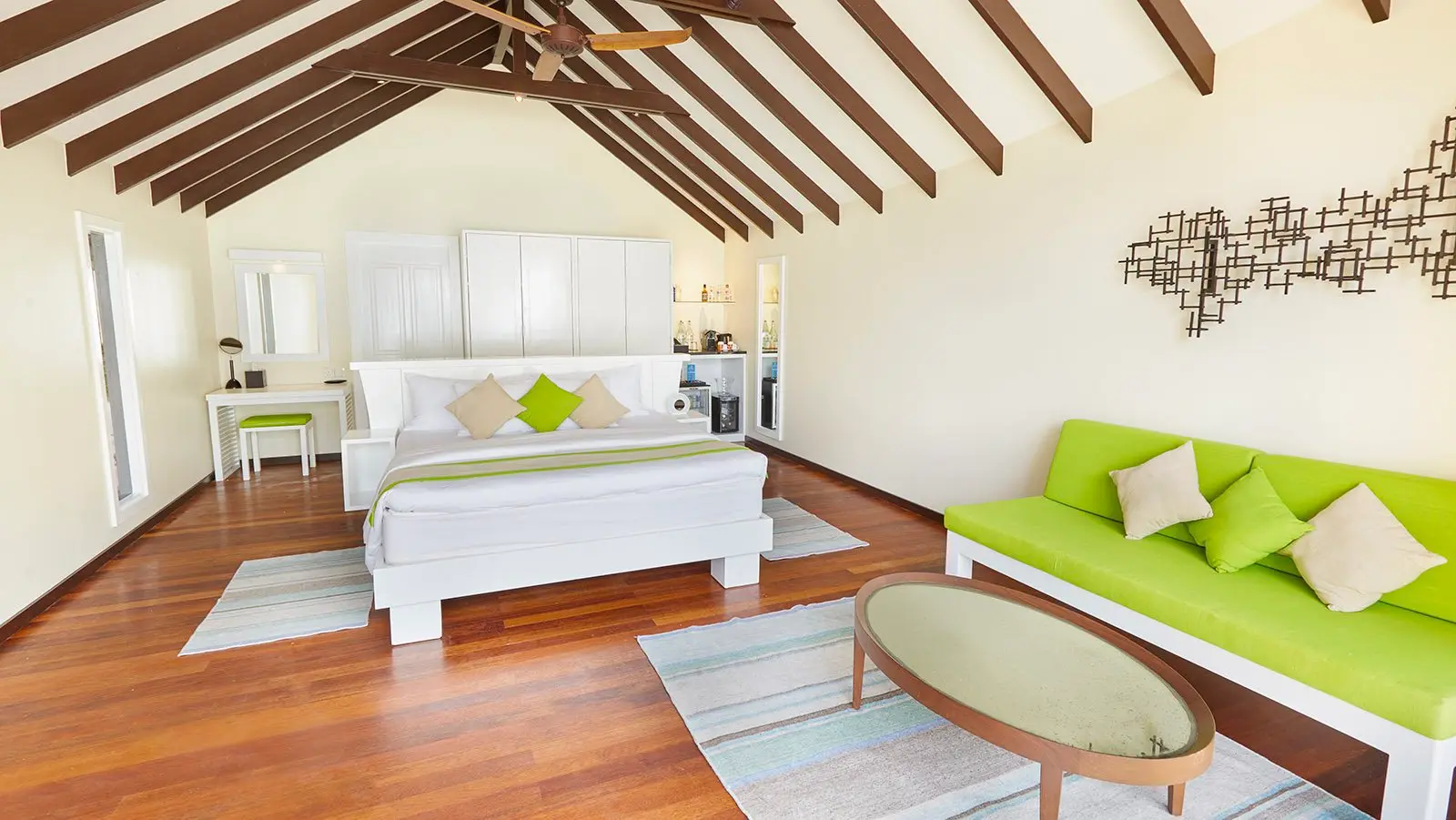 kuredu island resort & spa maldives deluxe beach villa interior bed