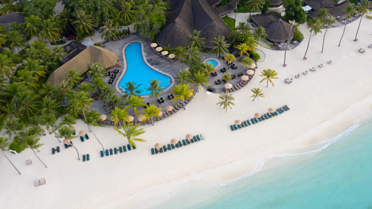 kuredu island resort & spa maldives main pool aerial