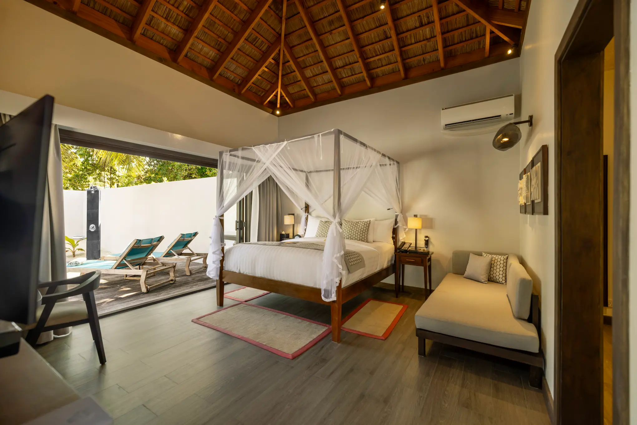 kuredu island resort & spa maldives private pool villa family suite interior bedroom