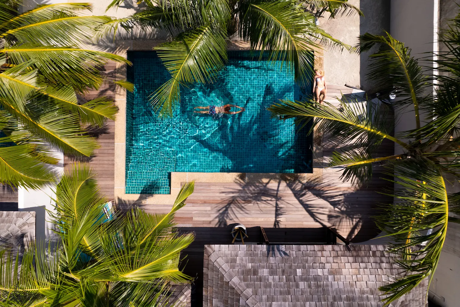 kuredu island resort & spa maldives private pool villas pool drone shot