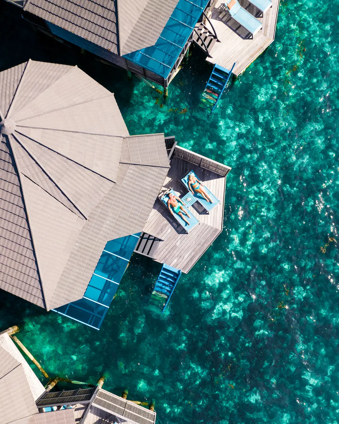 kuredu island resort & spa maldives sangu water villa drone