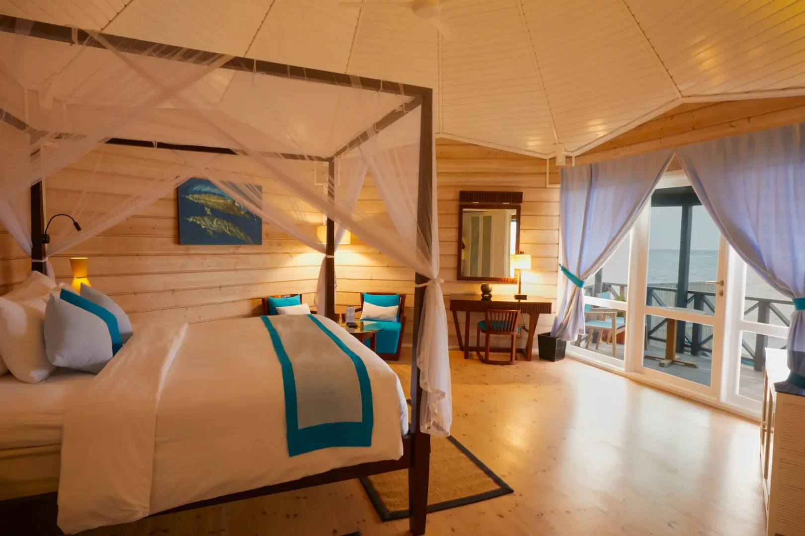 kuredu island resort & spa maldives sangu water villa interior bed view