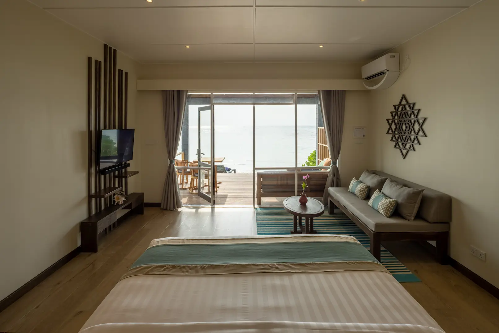 kuredu island resort & spa maldives two bedroom beach villa interior bed with view