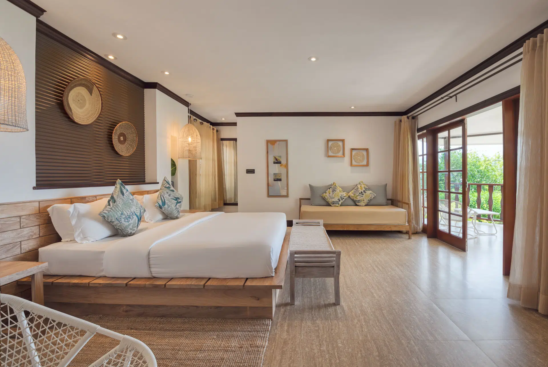 larchipel seychelles deluxe room bedroom with king bed