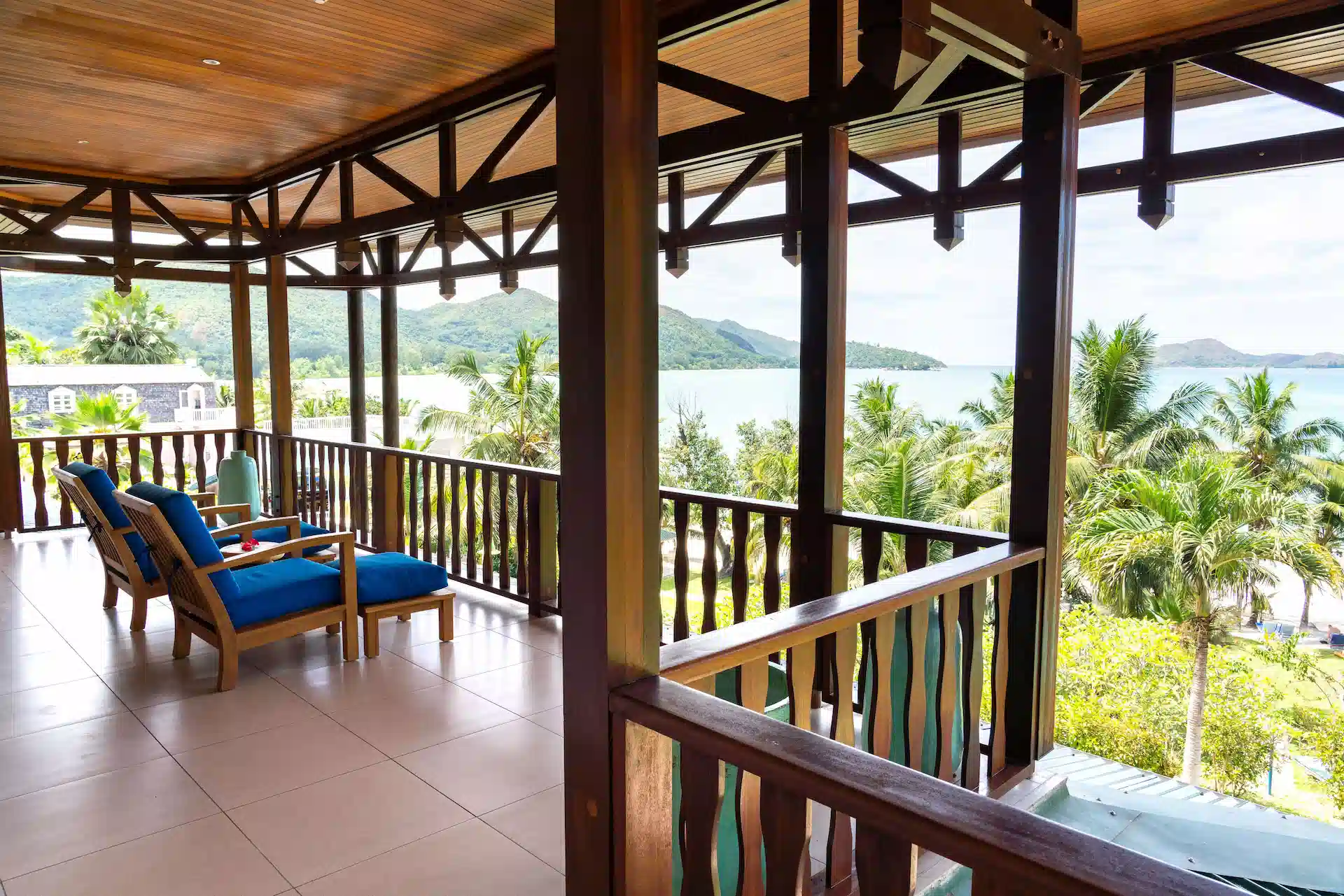 larchipel seychelles family suite balcony with seating area and tropical ocean view