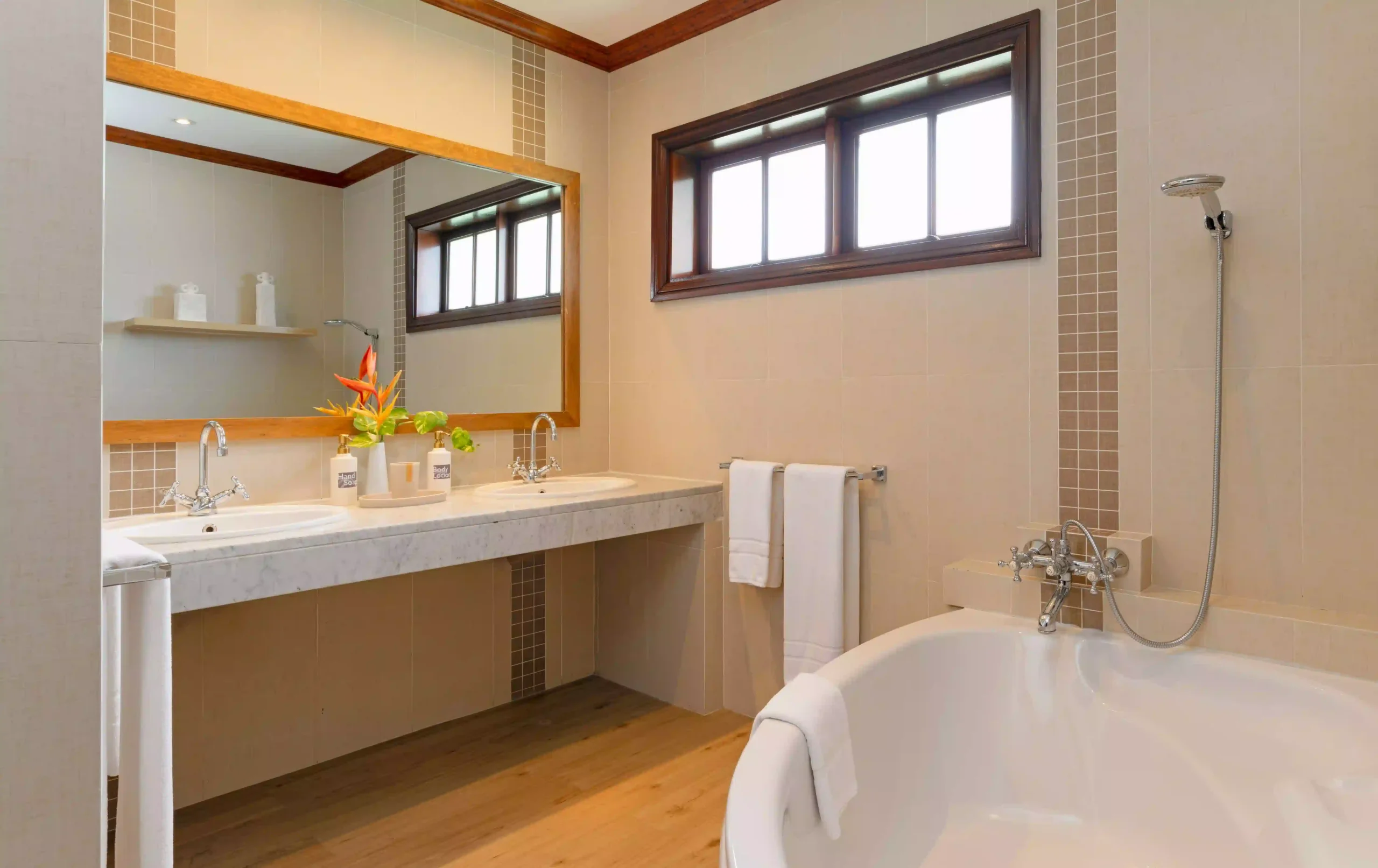 larchipel seychelles senior suite bathroom with freestanding tub