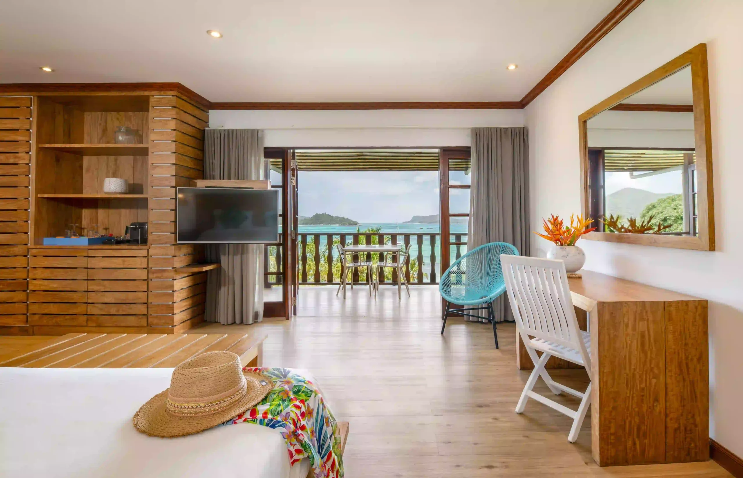 larchipel seychelles senior suite bedroom with king bed