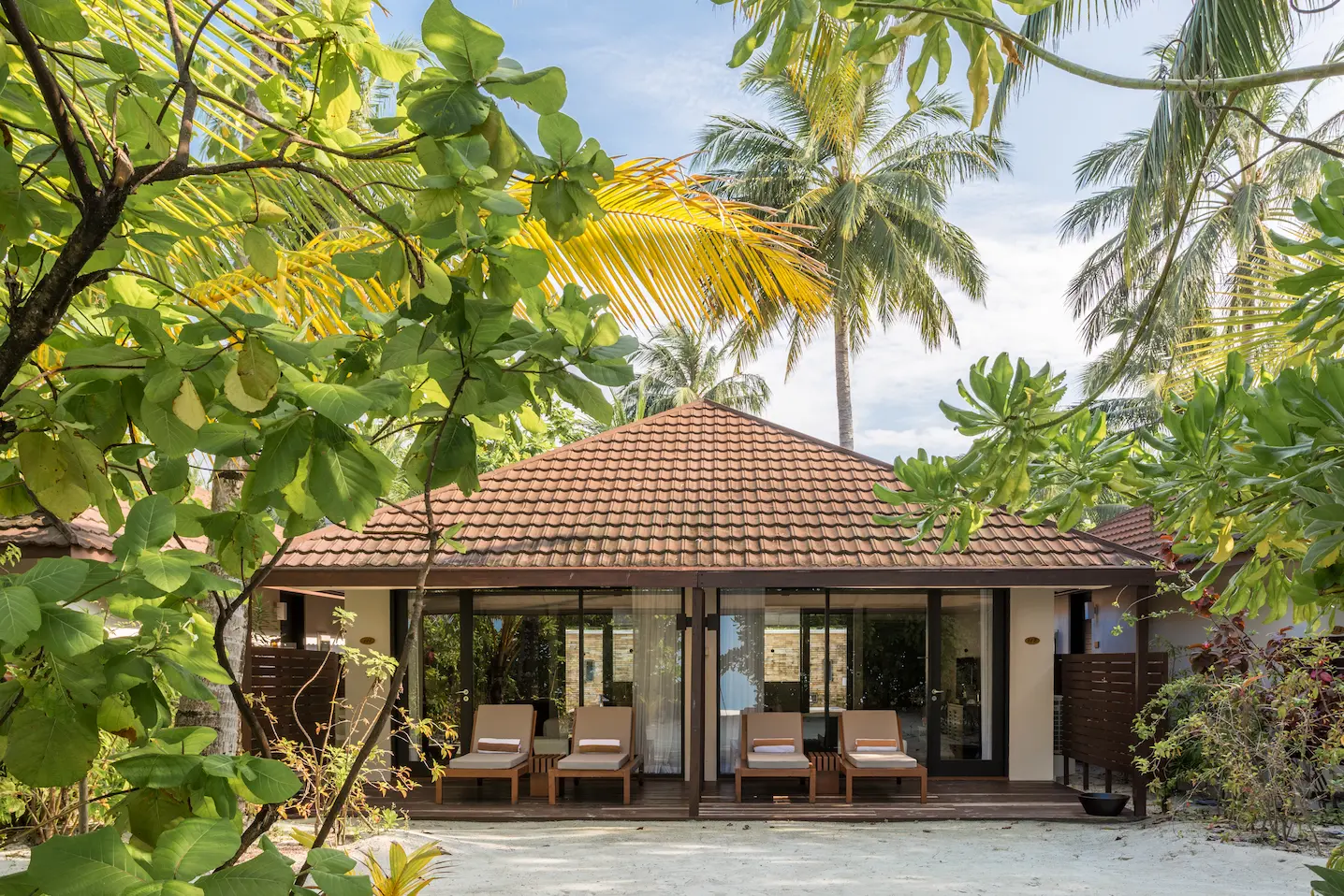 lily beach maldives beach family villas exterior set along the shoreline with spacious tropical design and serene ocean surroundings