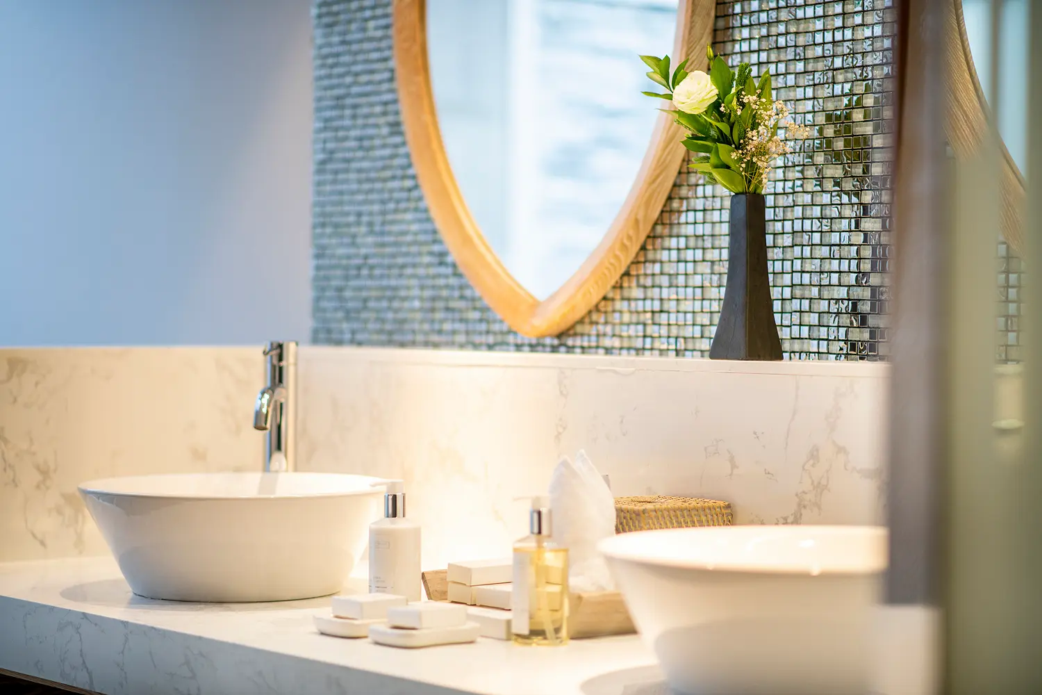 lily beach maldives beach suite with pool double sink bathroom featuring elegant modern finishes soft natural lighting and a serene spacious tropical ambience
