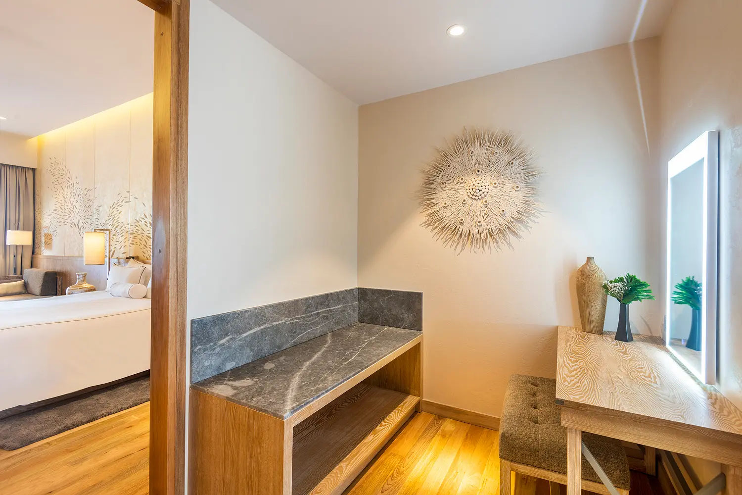 lily beach maldives beach suite with pool luggage room featuring organized storage space elegant tropical detailing and a serene spacious ambience