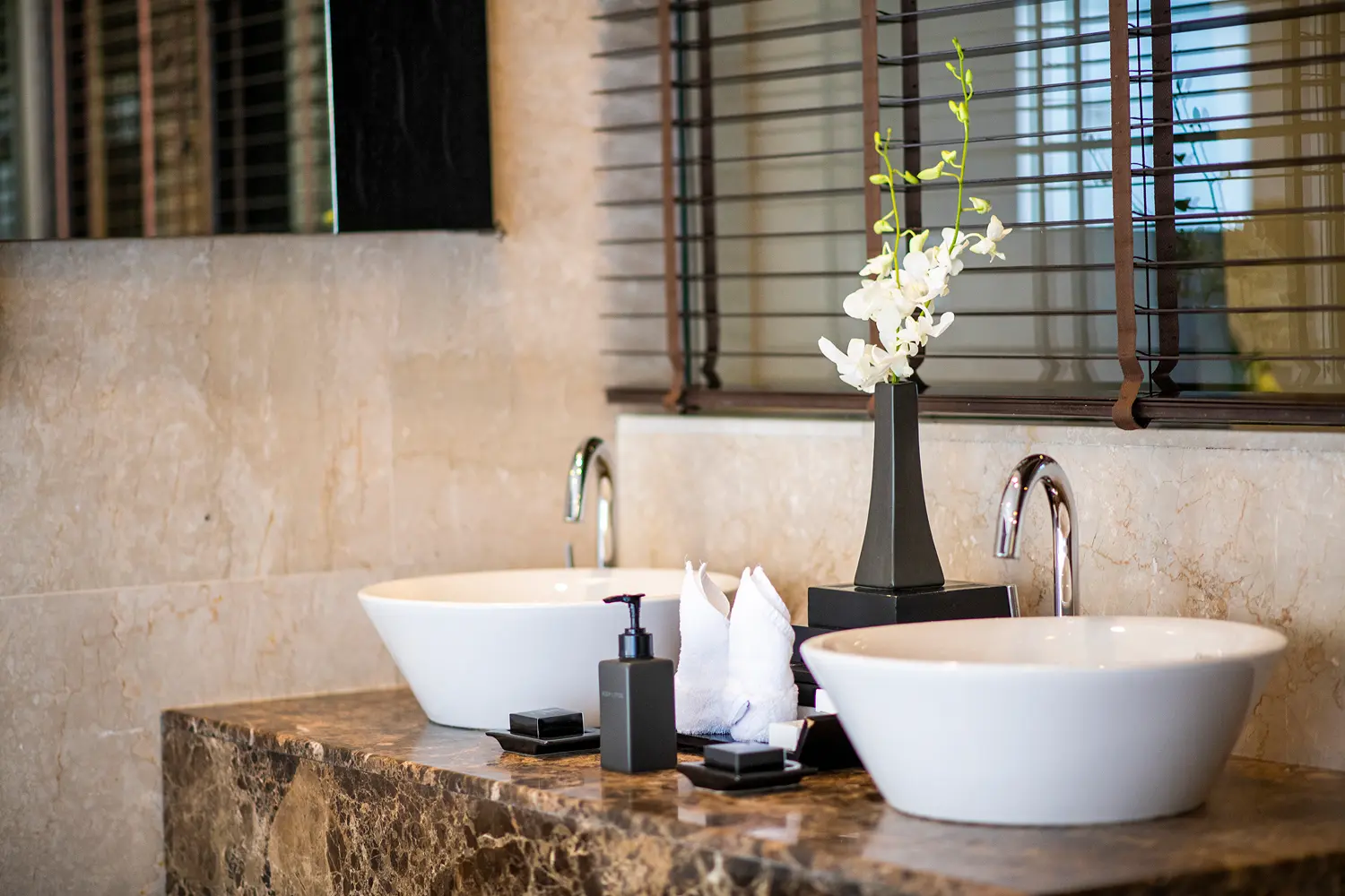 lily beach maldives beach villa sink area featuring elegant modern finishes with a serene tropical ambience