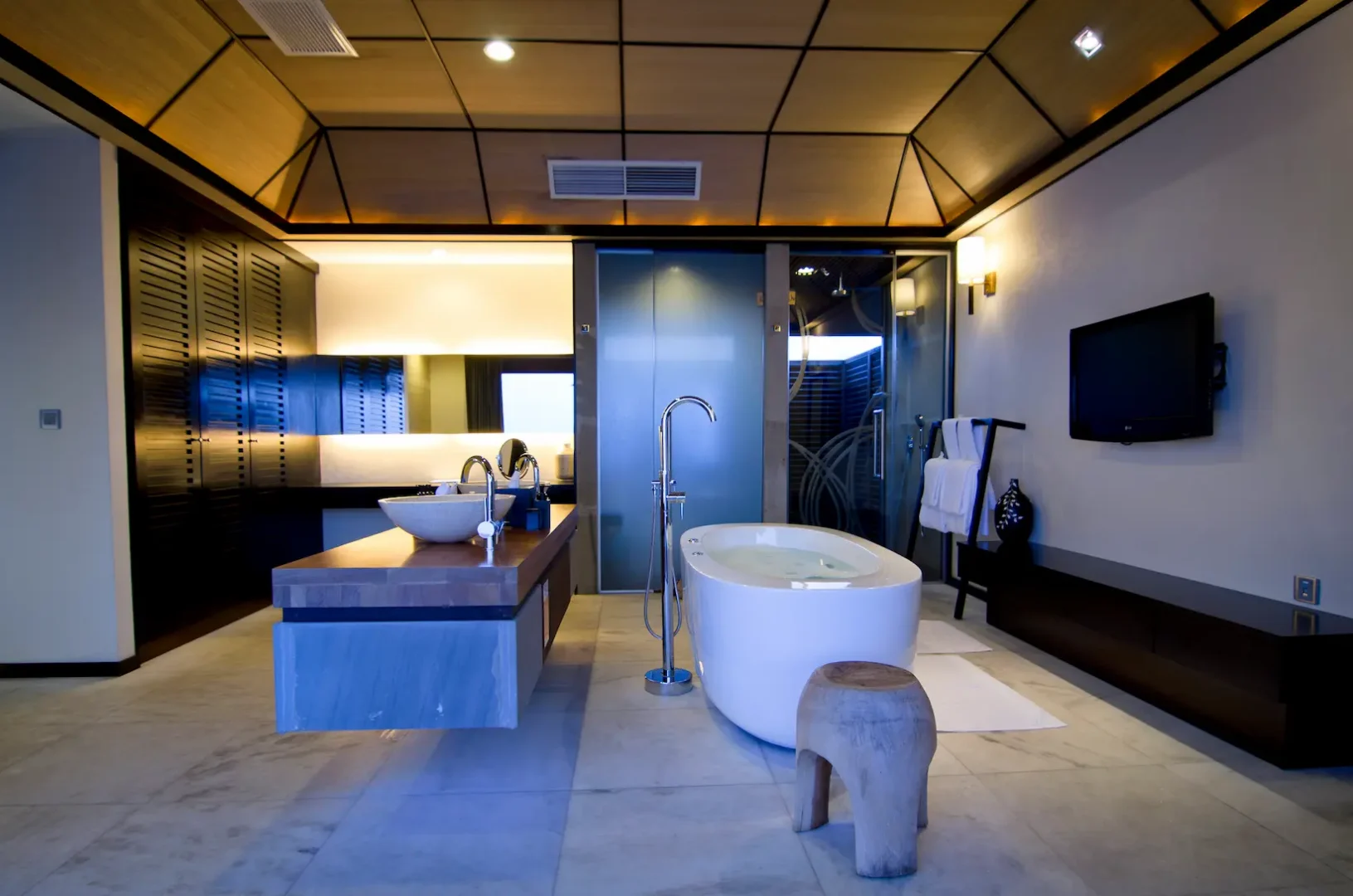 lily beach maldives deluxe water villa bathroom featuring elegant modern finishes a spacious open layout and serene lagoon inspired luxury