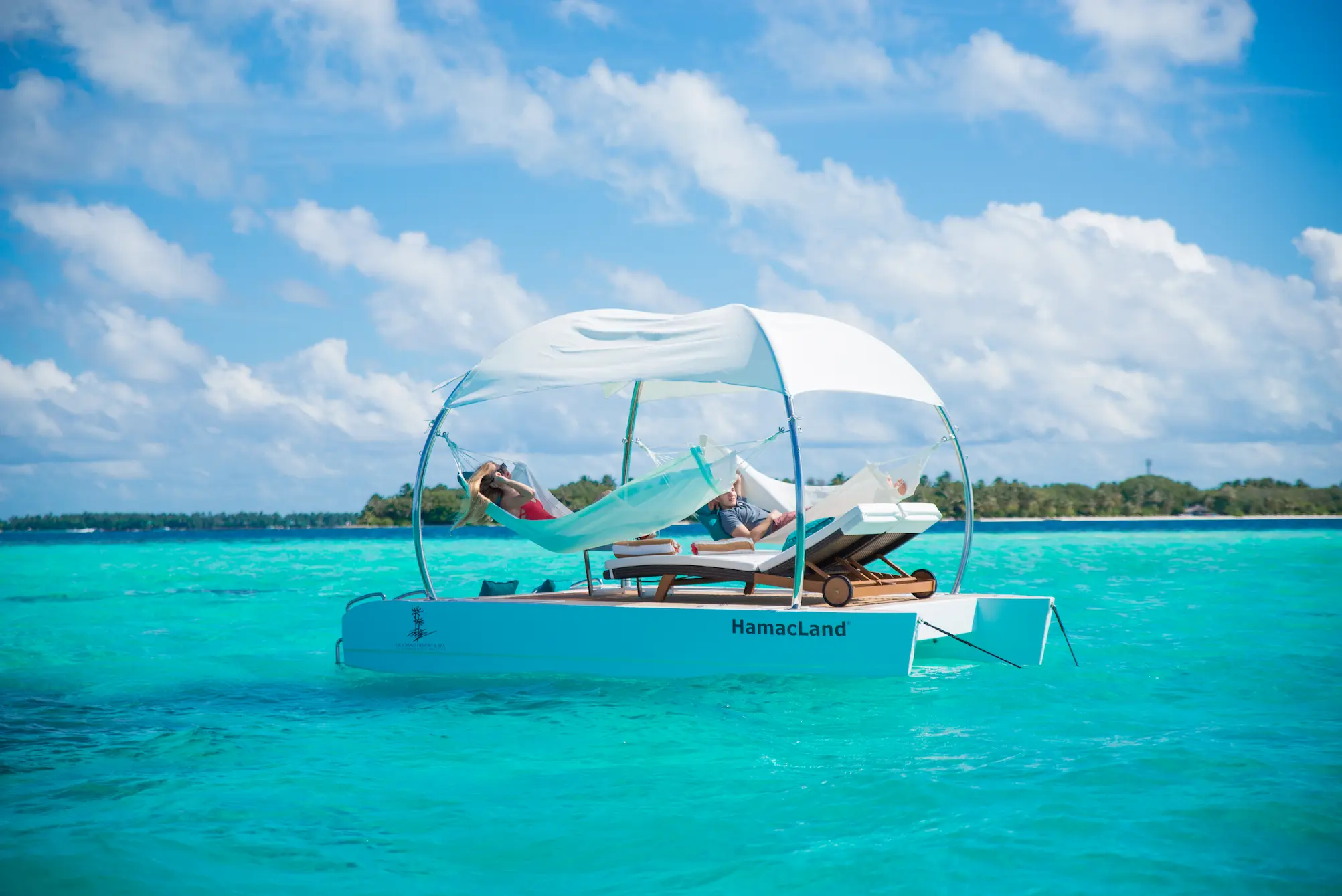 lily beach maldives hamacland floating lounger experience offering serene ocean relaxation with gentle turquoise water and peaceful tropical ambience