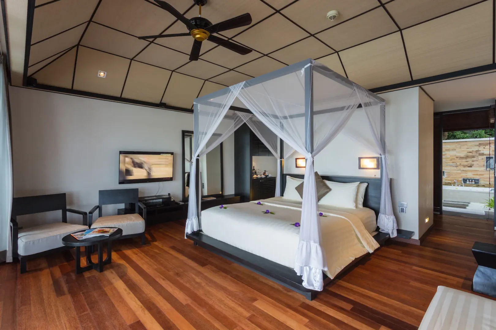 lily beach maldives lagoon villa interior featuring elegant tropical design with soft natural light and a serene lagoon inspired ambience