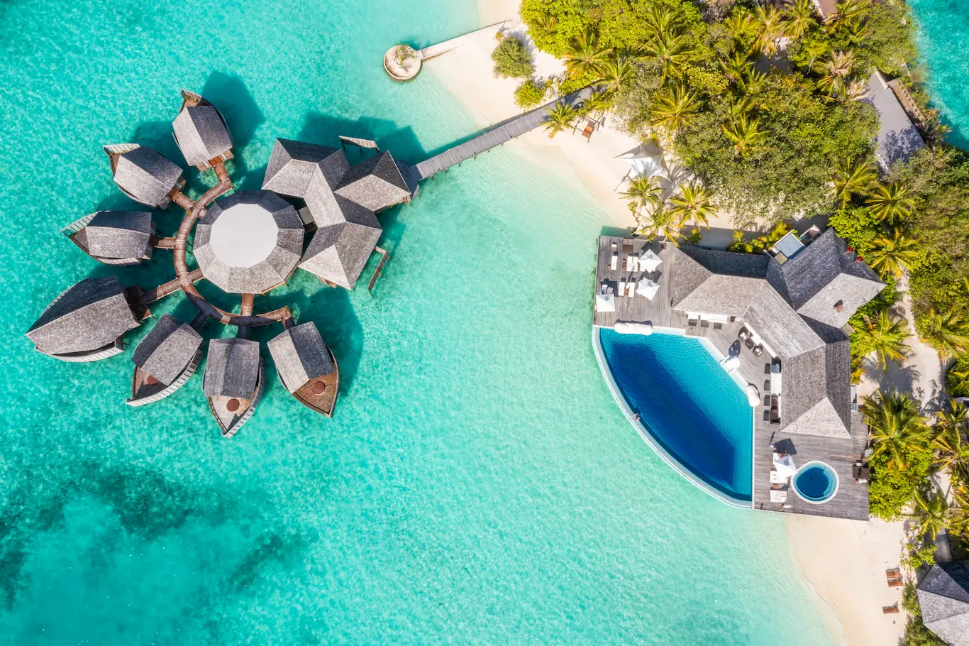 lily beach maldives resort aerials showcasing the island lagoon and tropical surroundings