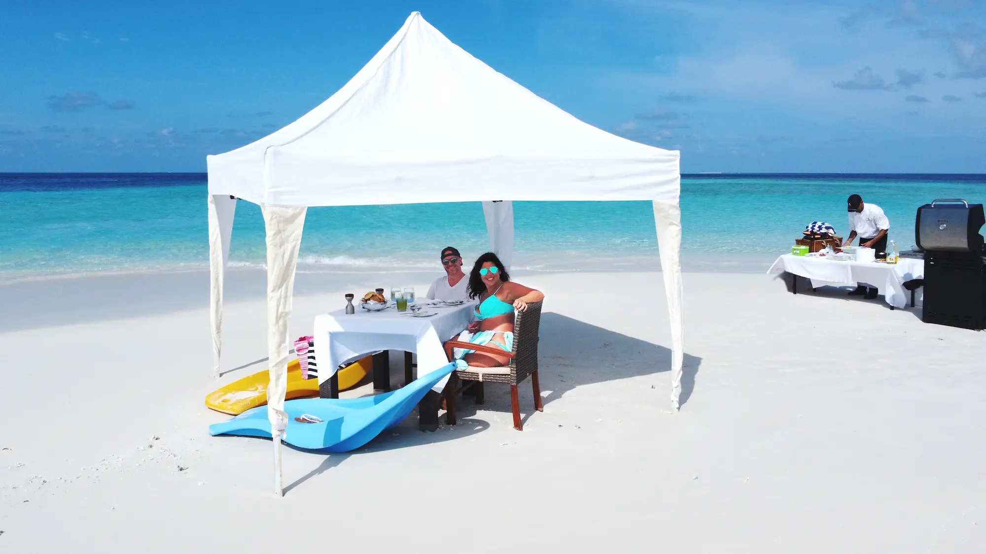 lily beach maldives sandbank picnic set on a secluded stretch of white sand with serene turquoise water and peaceful tropical ambience