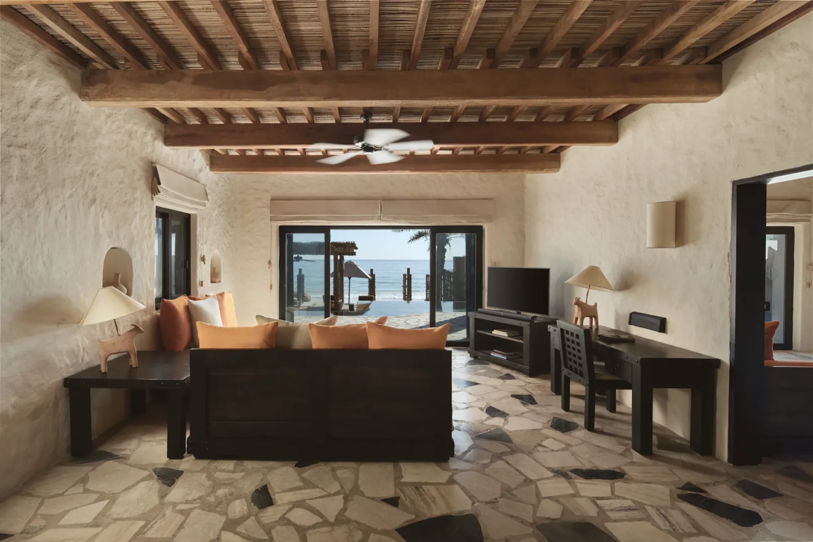 lounge in duplex two bedroom pool villa suite at six senses zighy bay oman