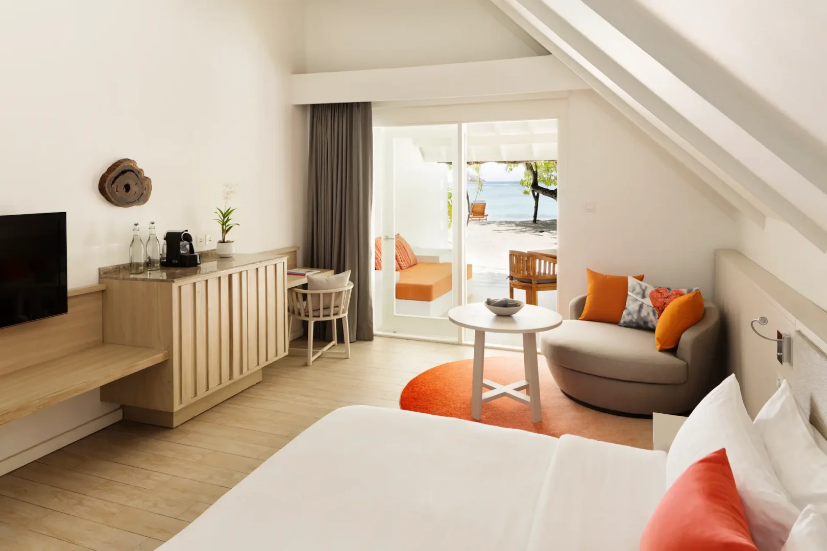 lux south ari atoll beach pavilion bedroom interior with serene island inspired design