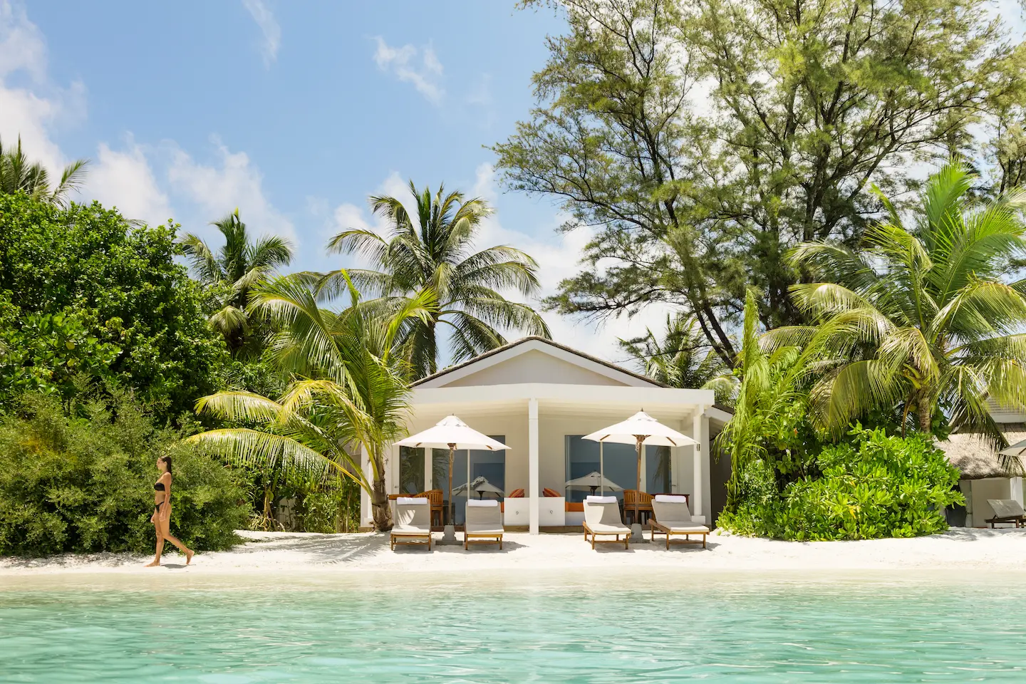 lux south ari atoll lagoon pavilion exterior with tranquil beachfront surroundings
