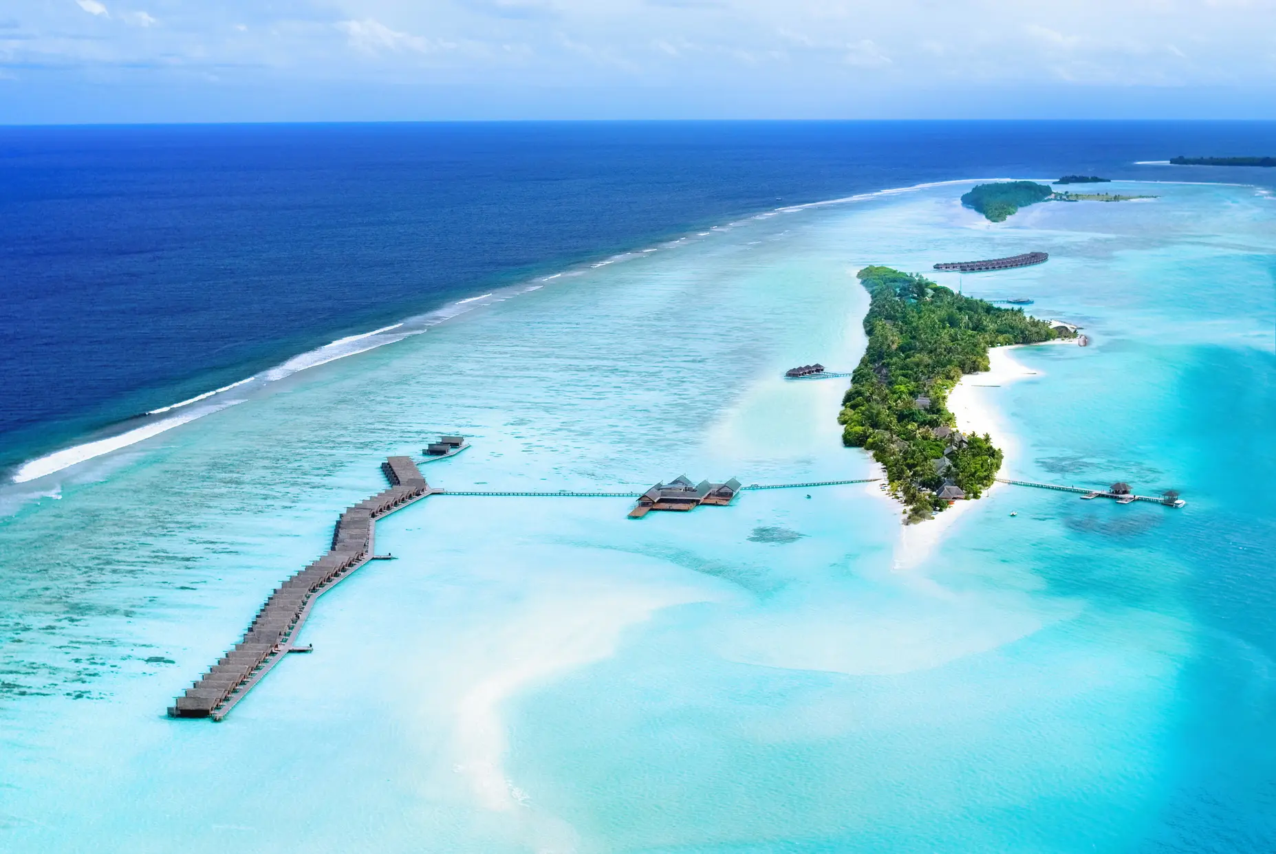 lux south ari atoll maldives island aerial view showcasing turquoise lagoon and tropical landscape