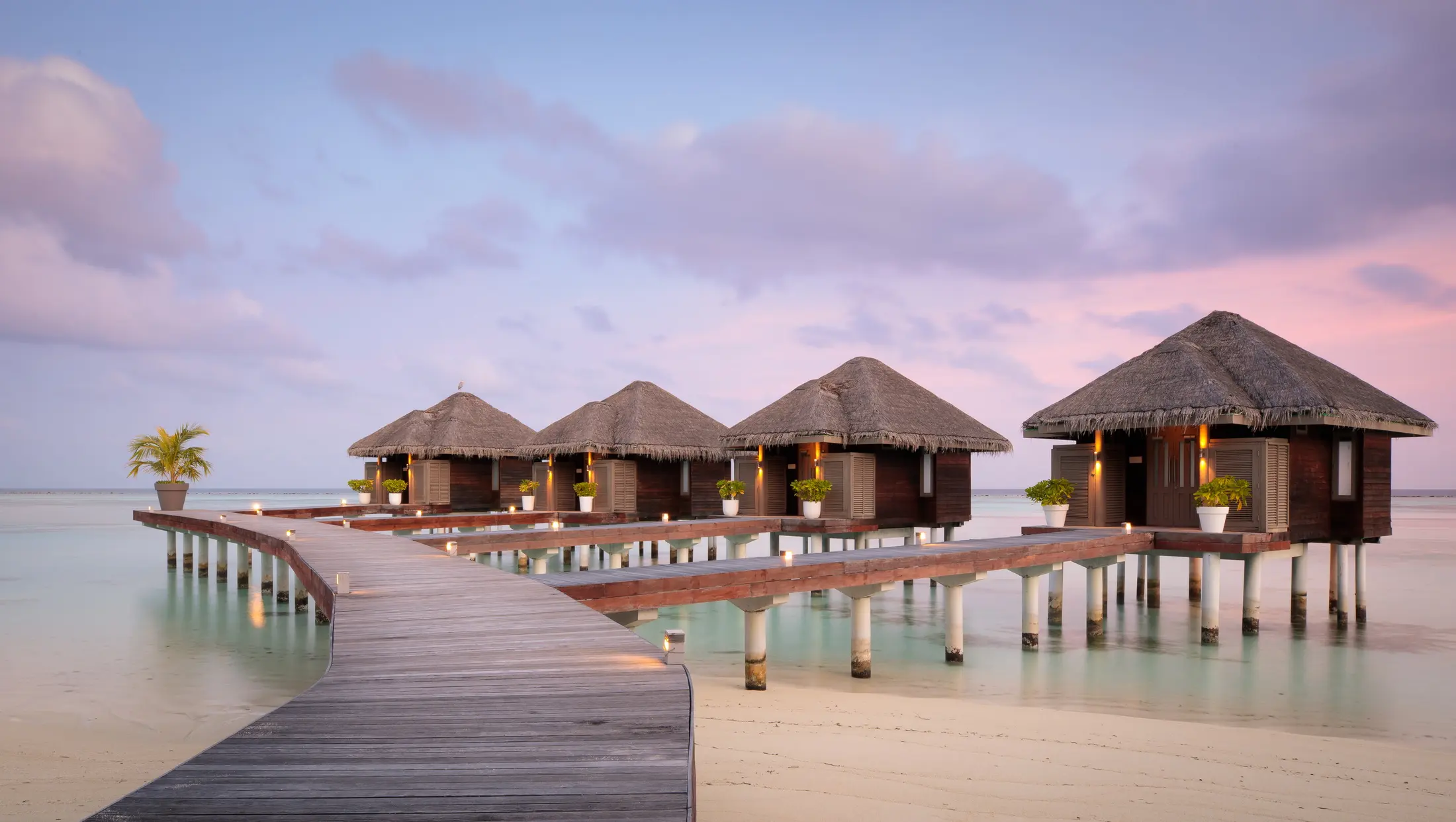 lux south ari atoll maldives spa overwater huts offering serene wellness treatments above the lagoon