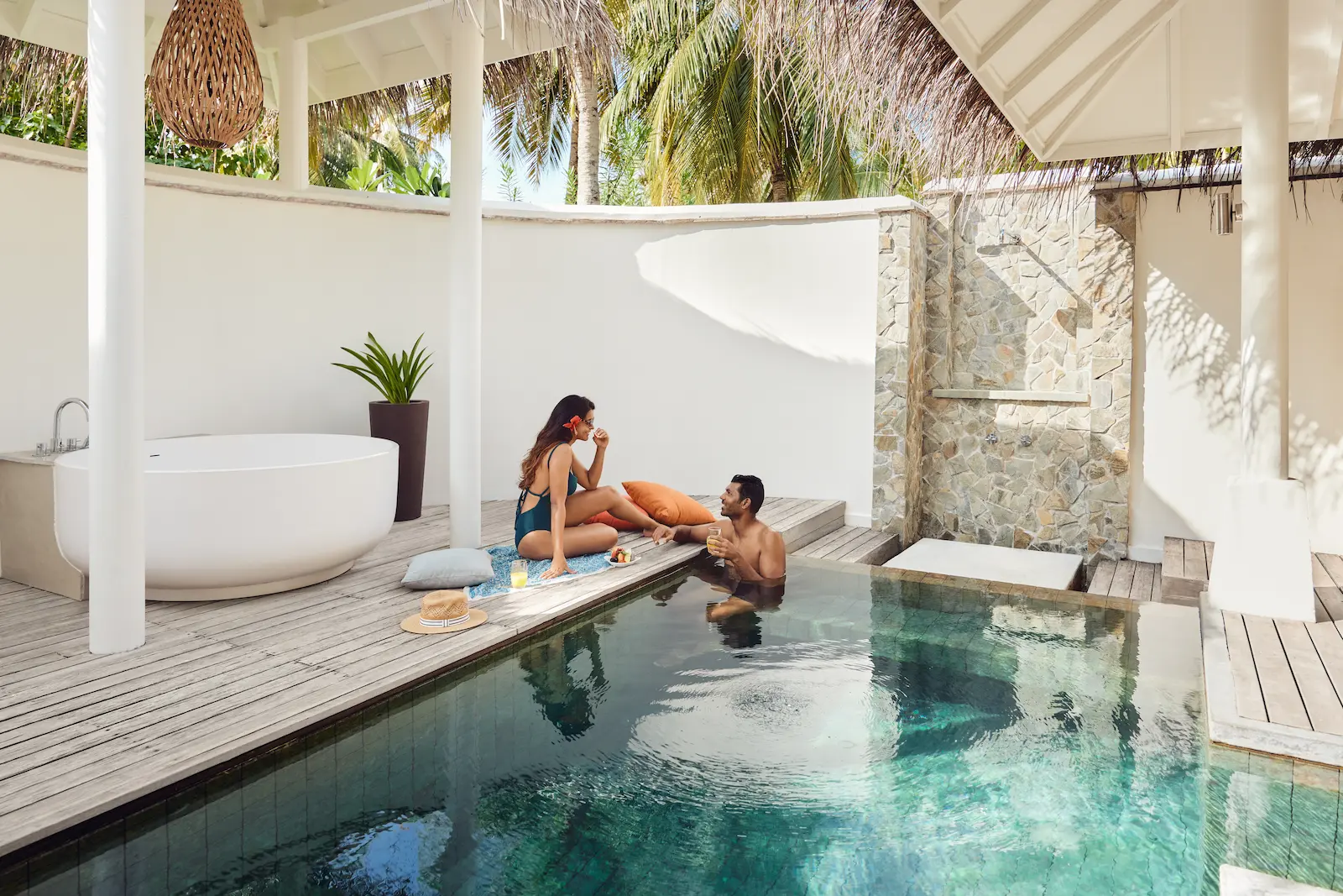 lux south ari atoll swimming pool with serene tropical lagoon surroundings