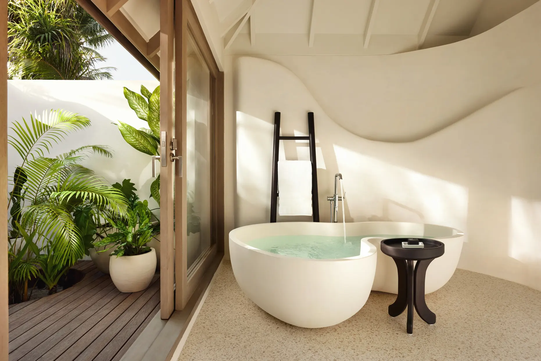 lux south ari atoll temptation beach pool villa bathroom with elegant island inspired design