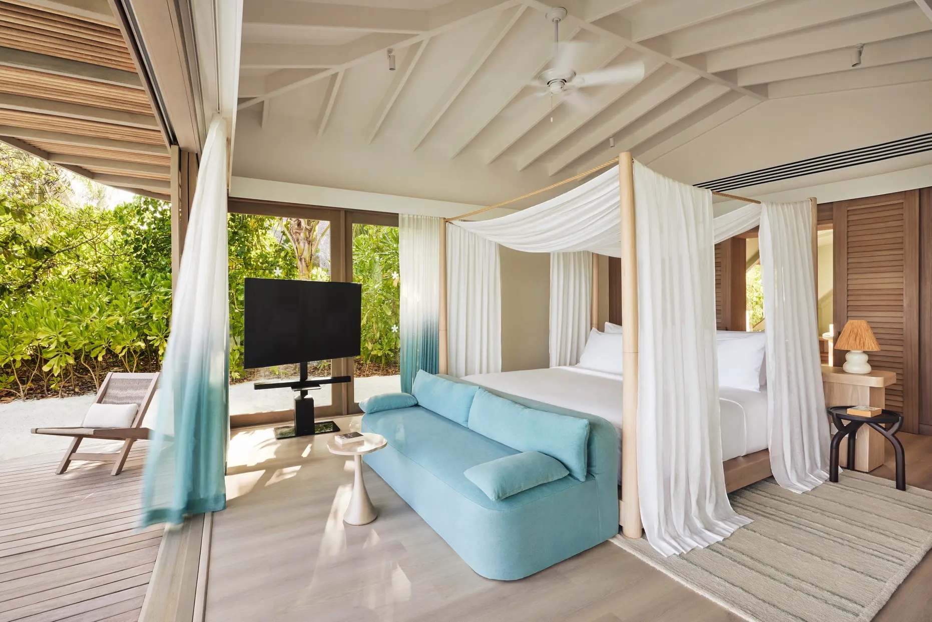 lux south ari atoll temptation beach pool villa bedroom with serene island inspired design
