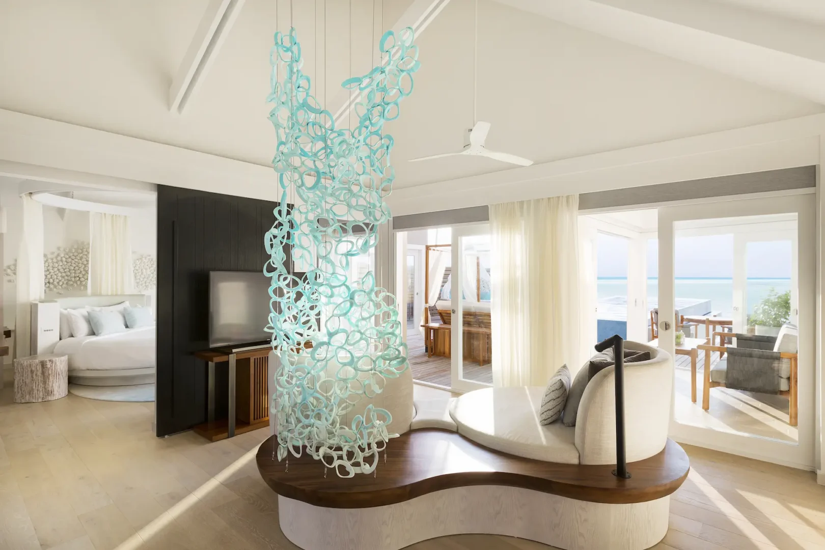 lux south ari atoll temptation pool water villas living area with elegant island inspired interior design