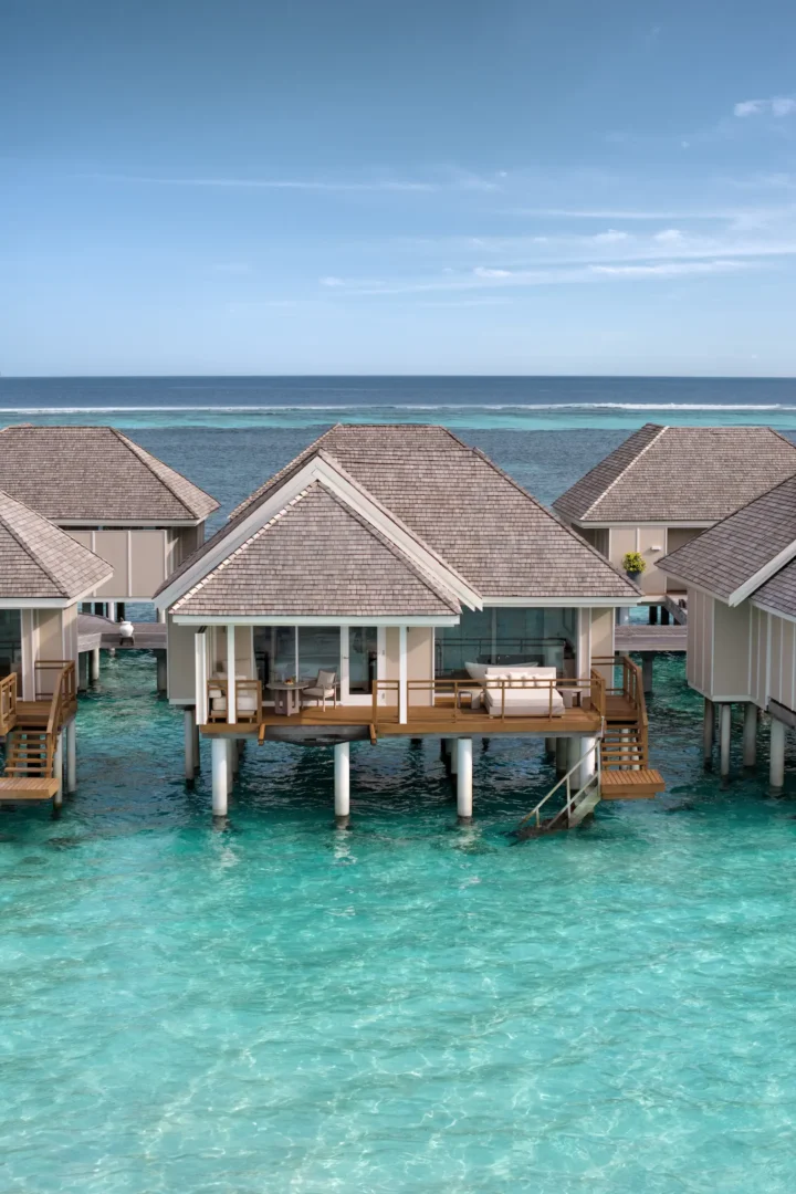 lux south ari atoll water villa exterior with serene lagoon facing design