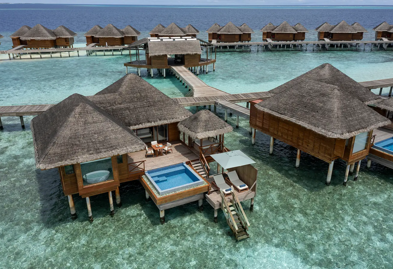 heritance aarah maldives lagoon bungalow exterior showcasing an elegant overwater hideaway with calm lagoon views and refined island serenity