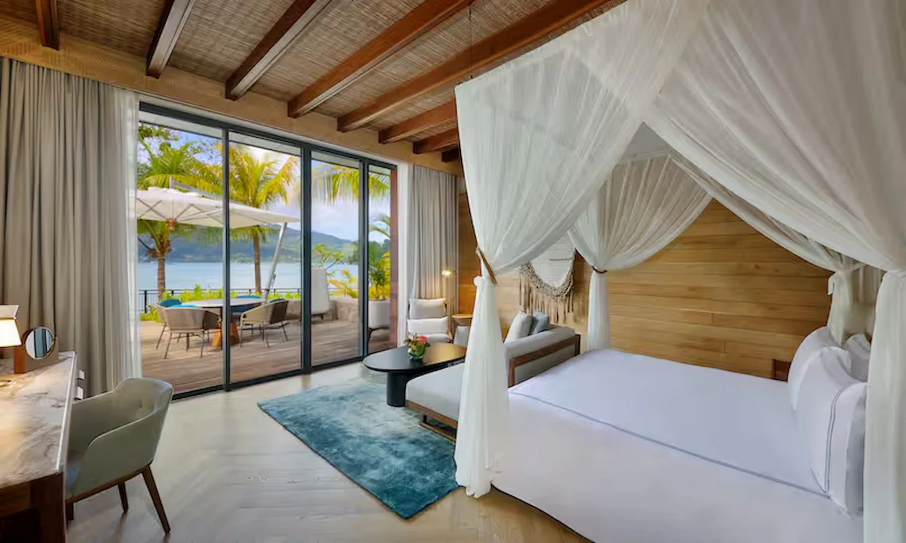 mango house seychelles one-bedroom bay house suite with plunge pool and bed view