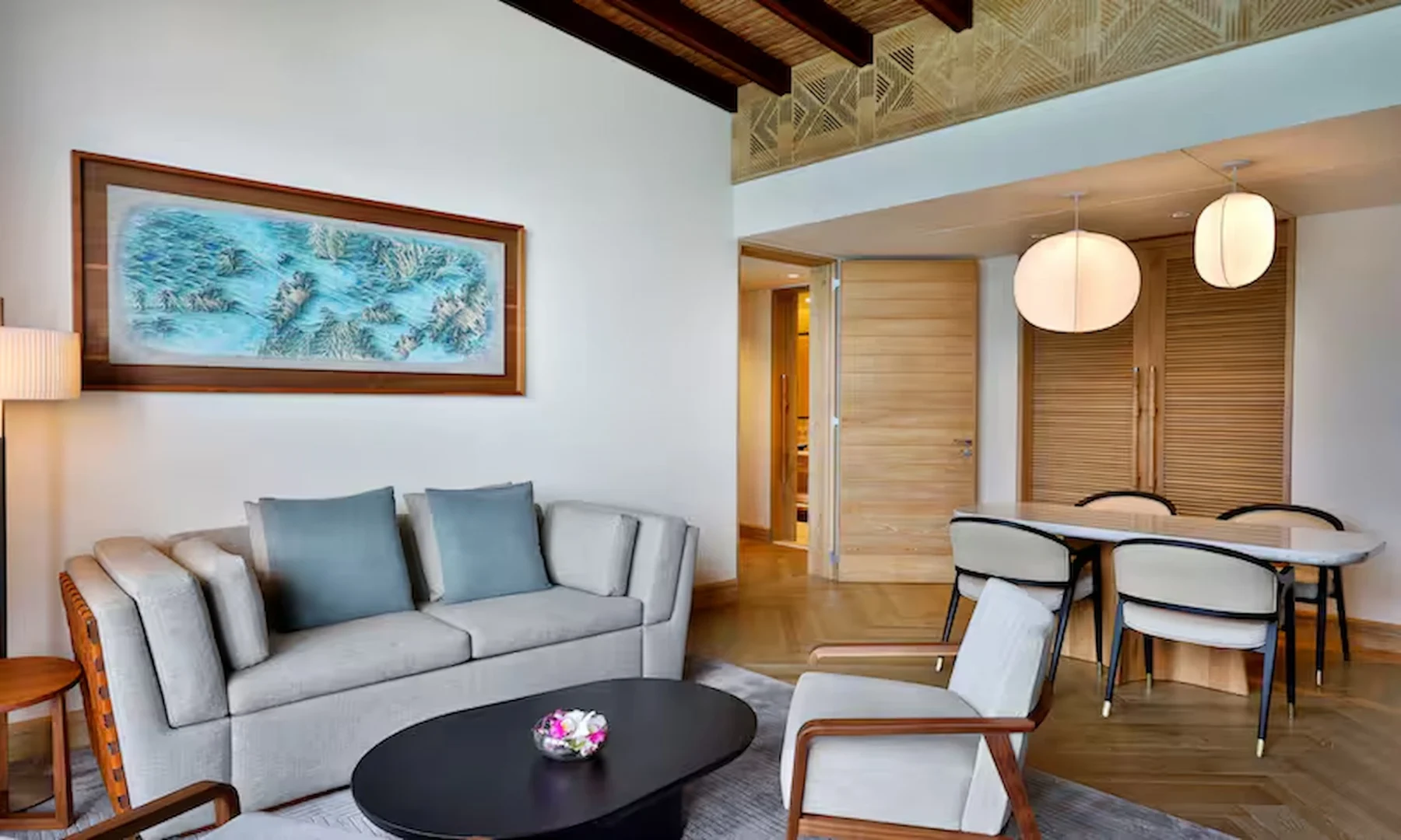 mango house seychelles one-bedroom suite with ocean view and sofa