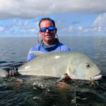 mark beachcomber tours fly fishing in shallow lagoon waters