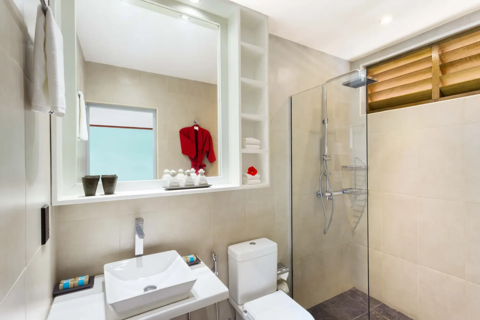 meeru maldives garden room bathroom with a calm spa like atmosphere soft natural tones and gentle ambient light creating a clean modern and relaxing resort experience