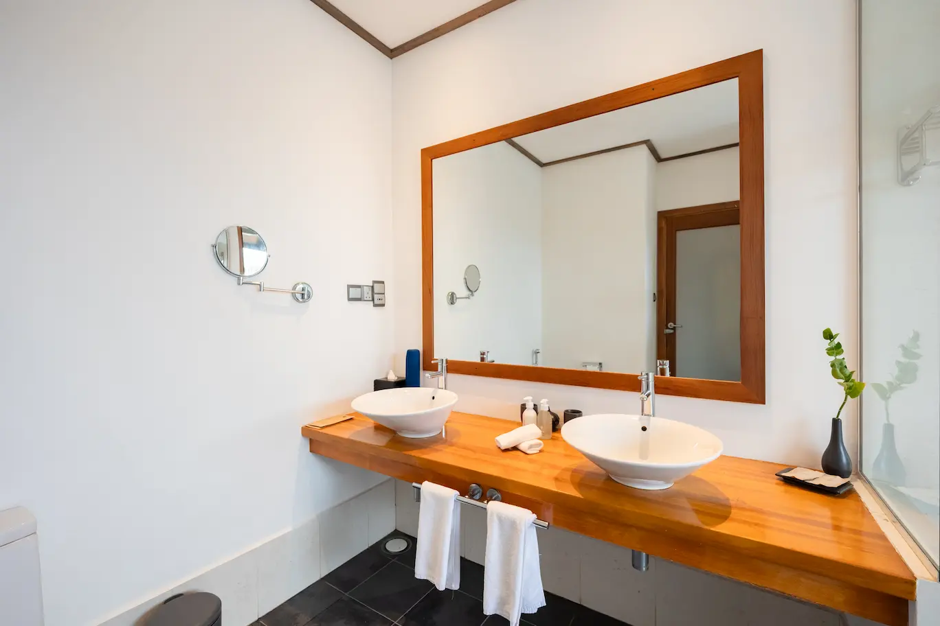 meeru maldives jacuzzi water villa bathroom with soft natural lighting elegant stone finishes and a calm contemporary design that enhances the resort’s relaxed luxury atmosphere