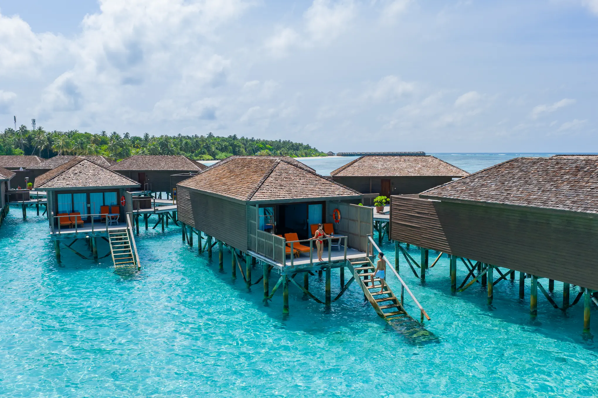 meeru maldives jacuzzi water villa terrace exterior with serene lagoon views warm natural light and a refined open space that reflects the resort’s relaxed luxury atmosphere