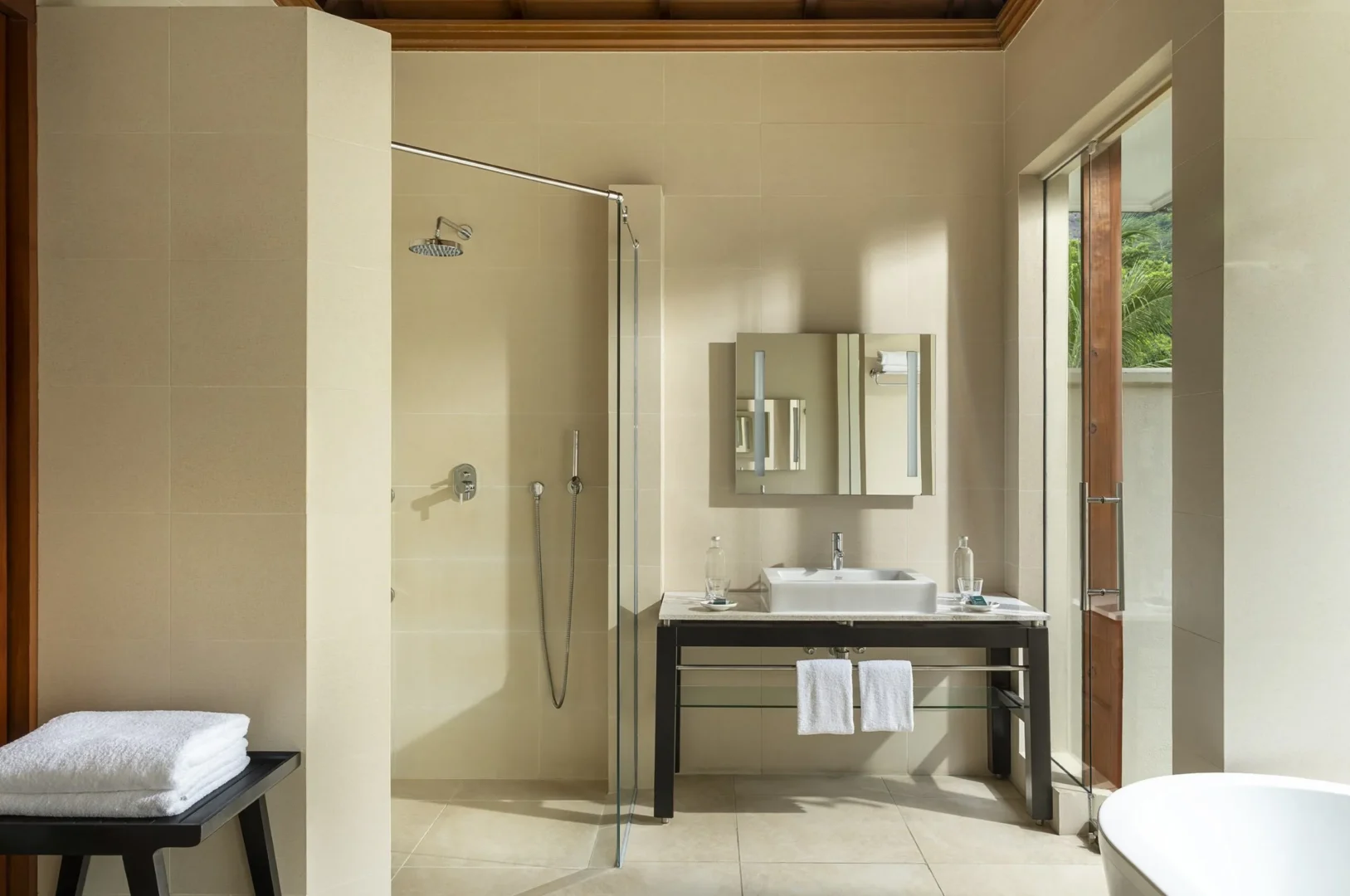 niva labriz seychelles beach villa bathroom with modern fixtures and ocean view