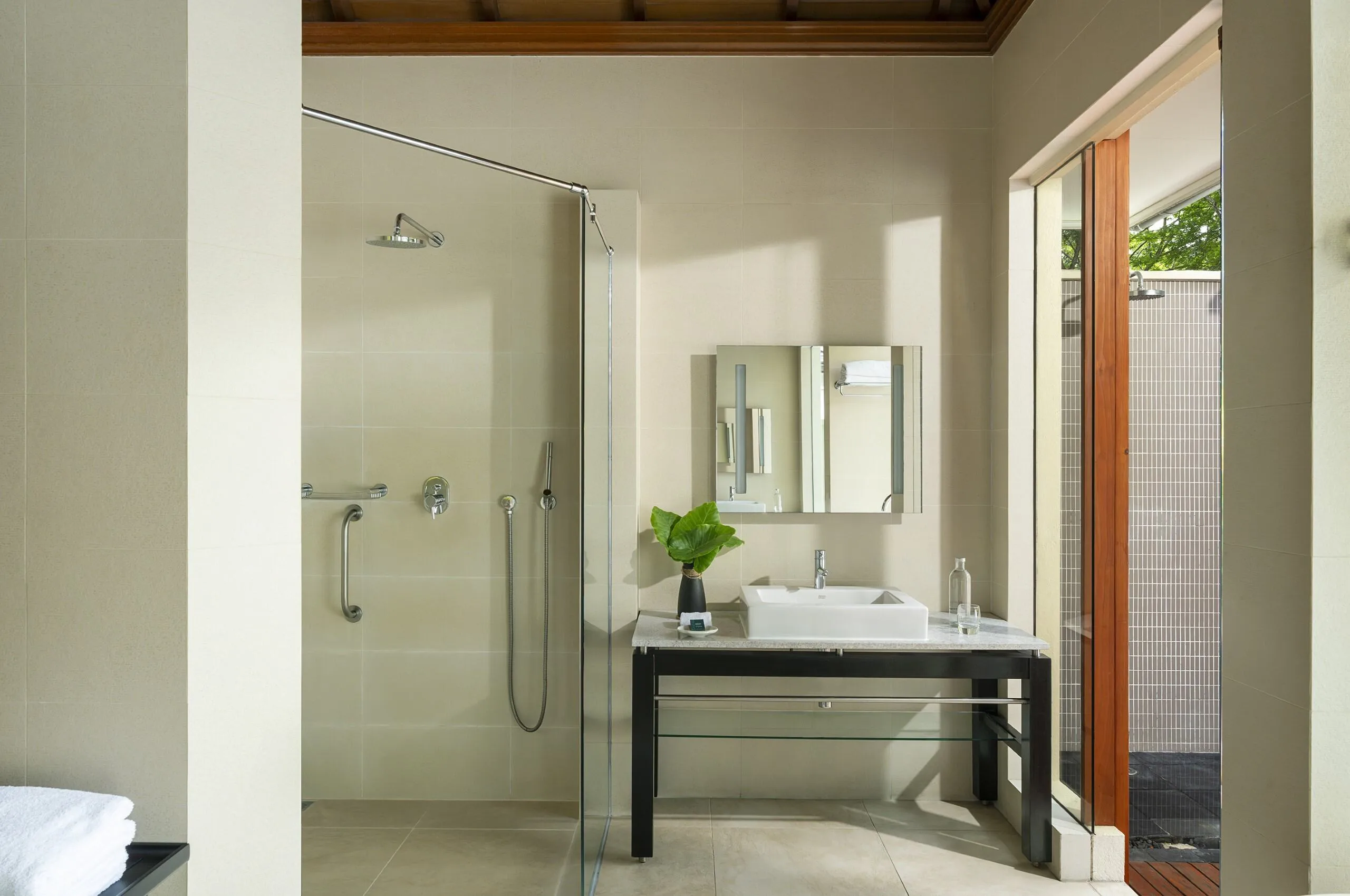 niva labriz seychelles beach villa with garden plunge pool bathroom with modern fixtures and tropical view