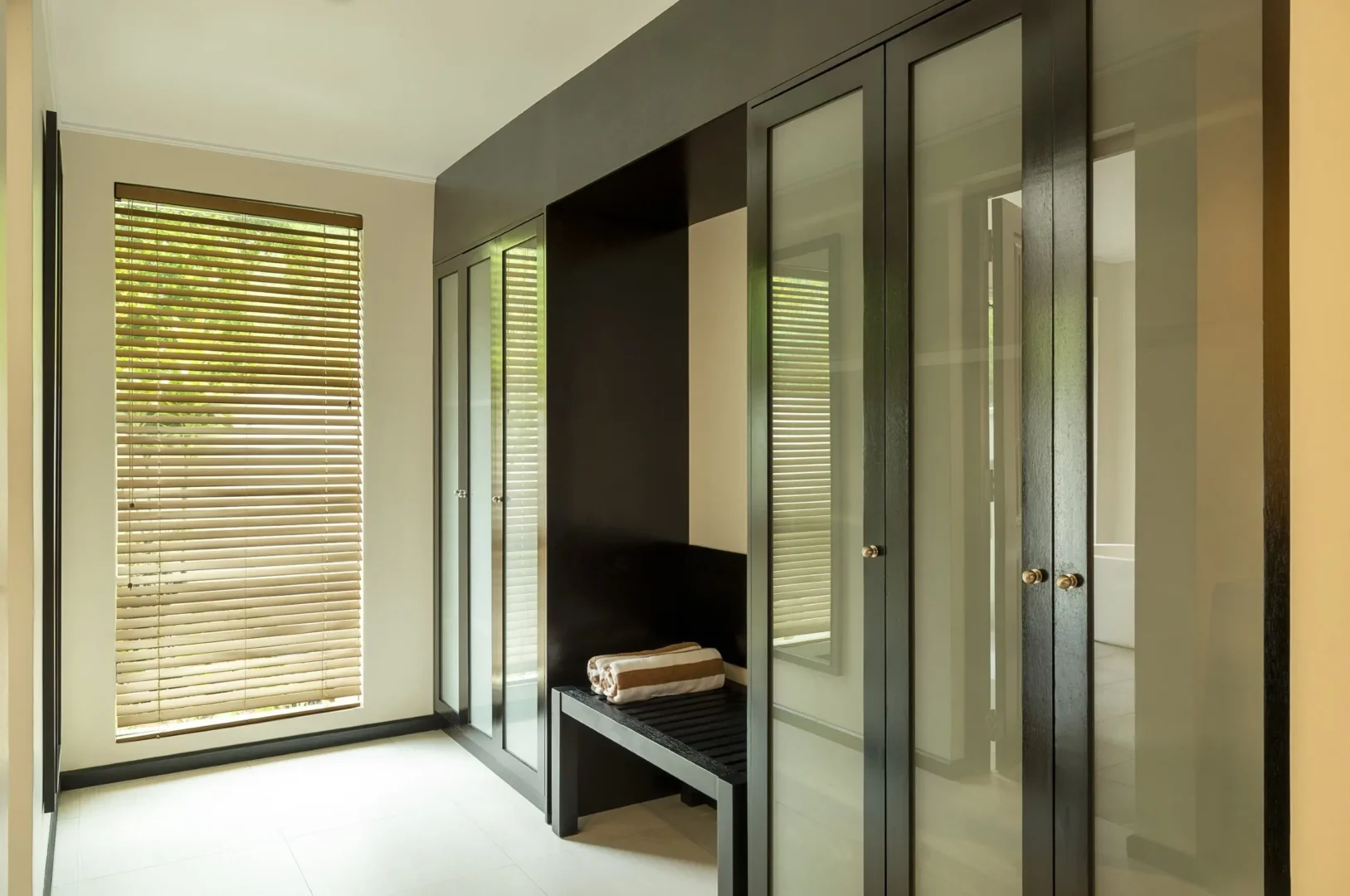 niva labriz seychelles beach villa with garden plunge pools wardrobe with organized storage and tropical decor