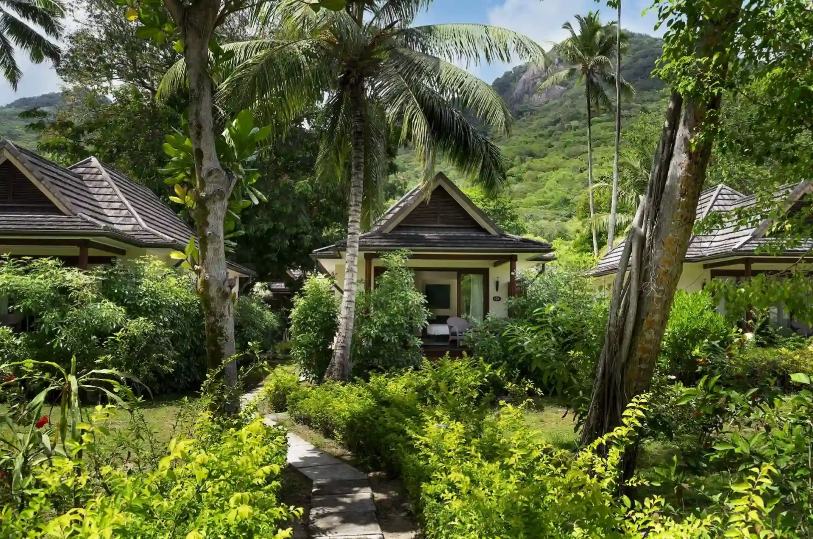 niva labriz seychelles garden villa exterior surrounded by lush tropical greenery