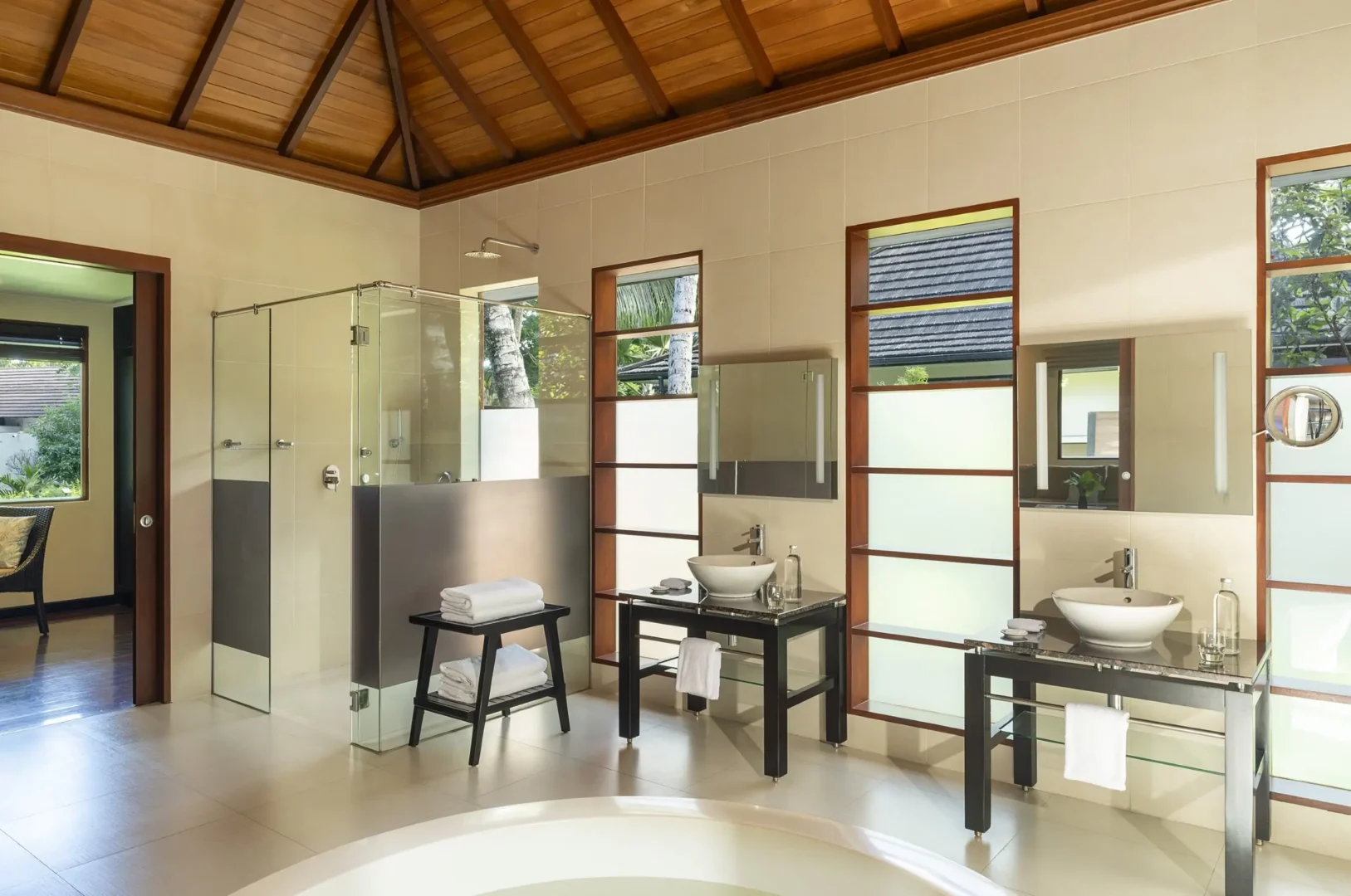 niva labriz seychelles jungle sanctuary pool villa bathroom with freestanding tub and jungle view