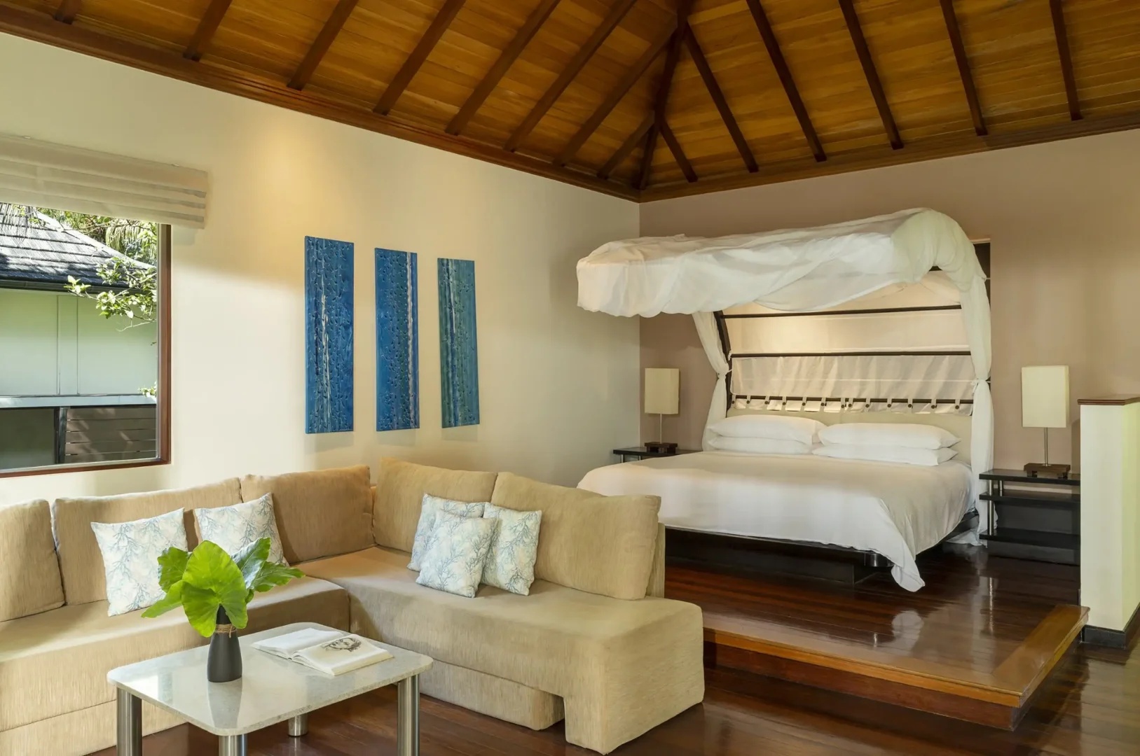 niva labriz seychelles jungle sanctuary pool villa bedroom with king bed and lush jungle view